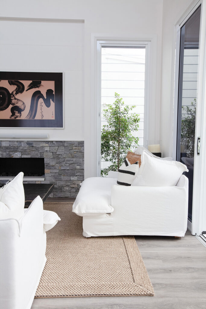 Interior design ideas for Queenslander homes in Brisbane – soft neutral palette with timber accents and natural textures