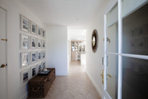 interior designer sorrento Entryway with curated decor and natural textures designed by Erica Interiors in armadale