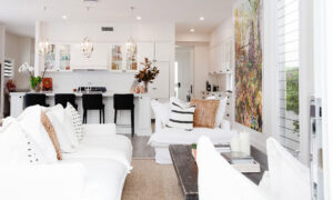 Light-filled Elwood living room with custom interior design by Erica Interiors featuring neutral tones and natural textures