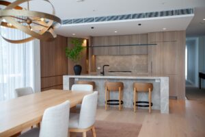 Timeless dining room with curated furnishings and coastal-inspired palette in Toorak residence